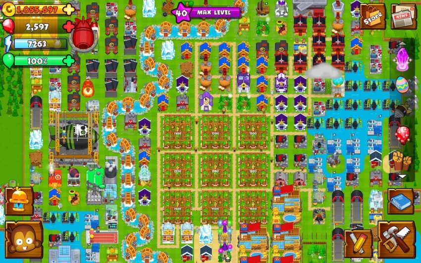 Peta kota strategis di Bloons Monkey City dengan menara monyet dan balon musuh